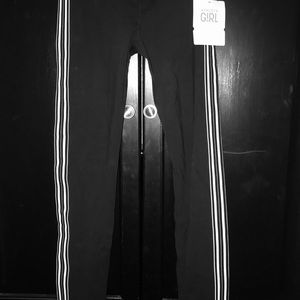 Athleta black leggings with white side stripes